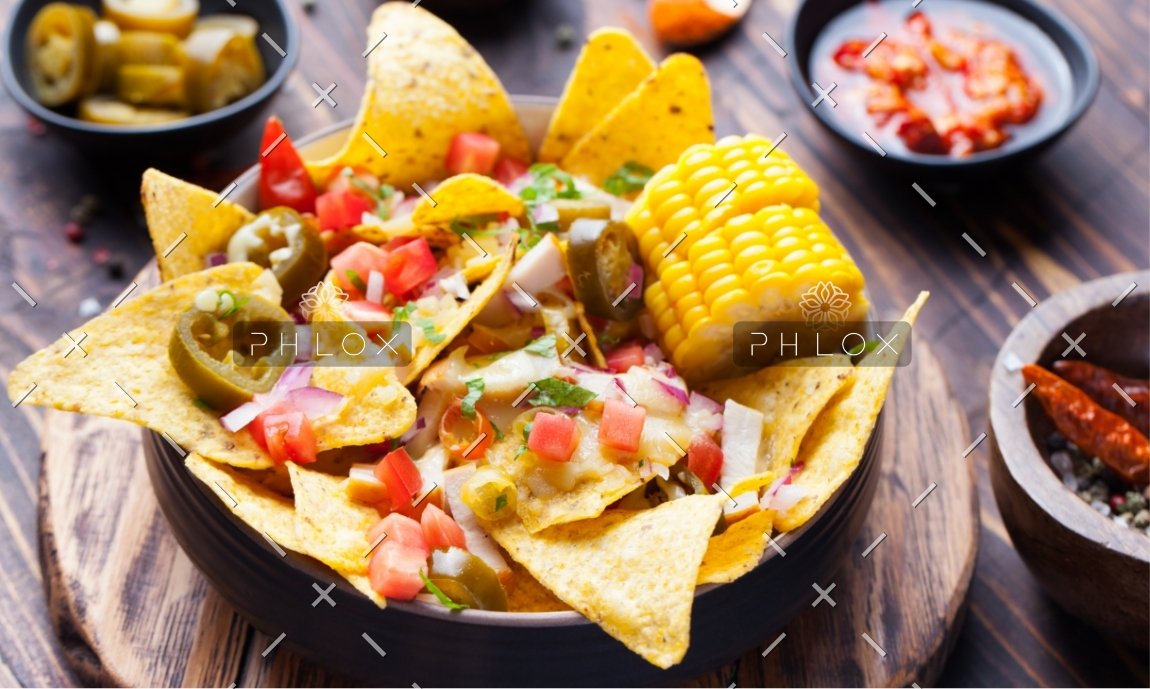 demo-attachment-1167-nachos-with-melted-cheese-sauce-salsa-corn-cobs-PMBWCHA